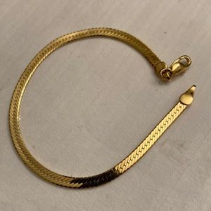 Unmarked Gold tone Herringbone BRACELET w/Lobster-claw Catch; 7.5”